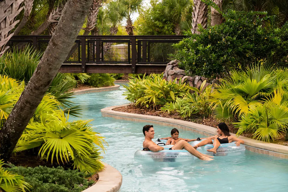 A family enjoying lazy River at Four Seasons Resort