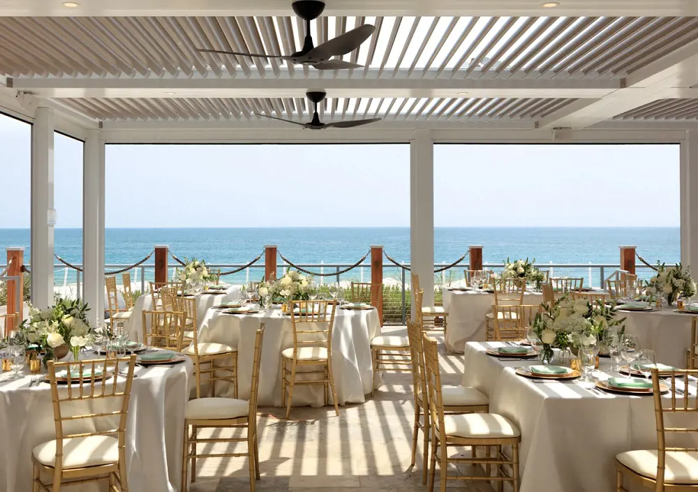 A beach facing perfect dinning tables in the hotel